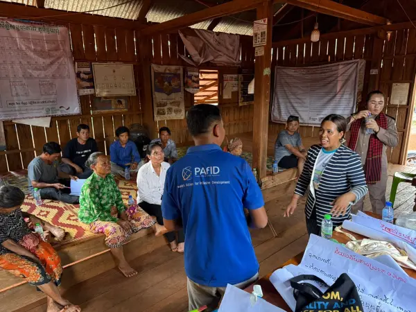 villagers were discussing with a PAfID staff.
