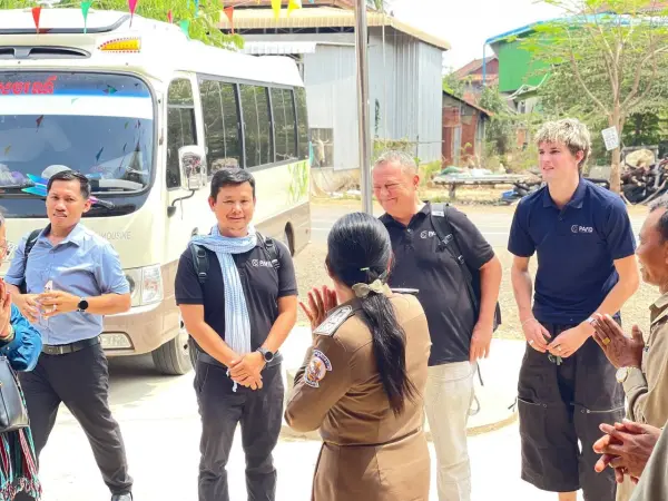 PAfID team greeting government officials.