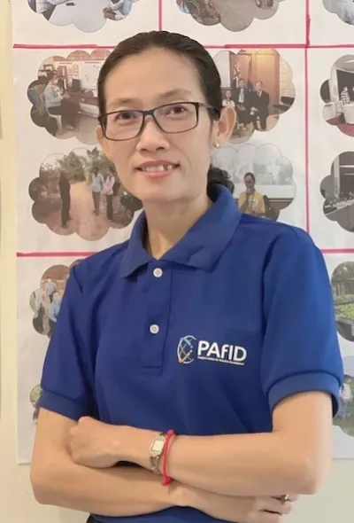 Ms. Sreytouch standing